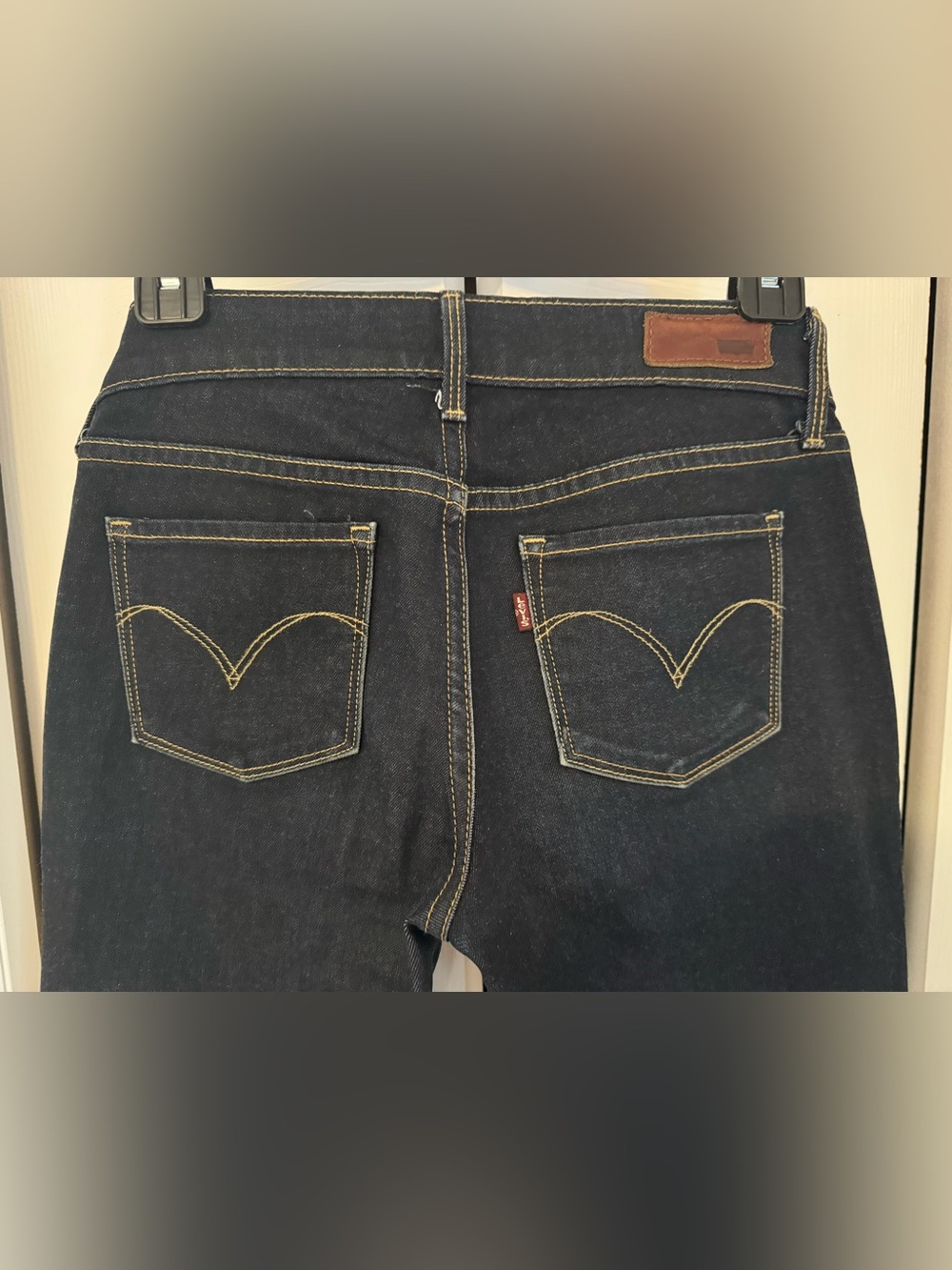 Levi's Slight Curve, Modern Rise, Straight Leg Jeans in Dark Indigo.